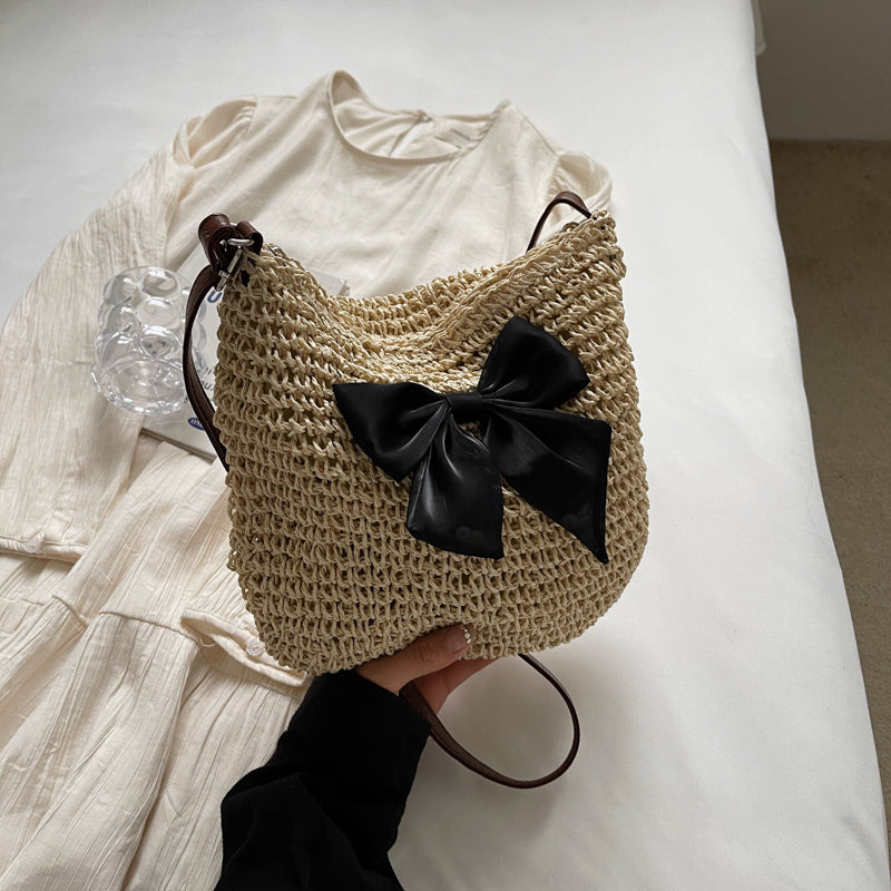 Hand-woven straw bucket bag