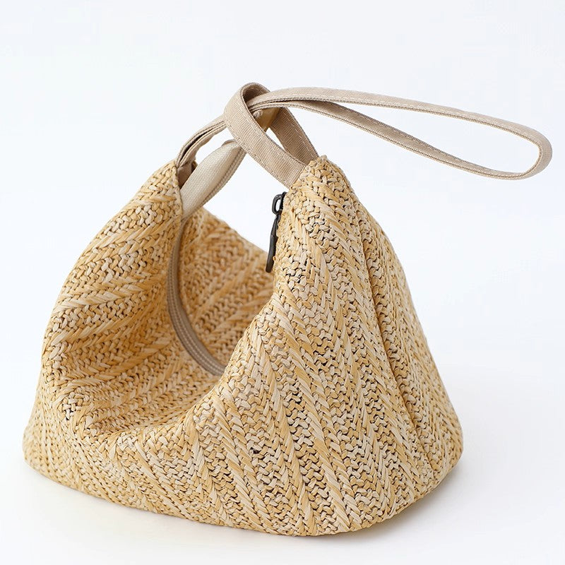 Handmade straw tote, clutch, and wristlet.