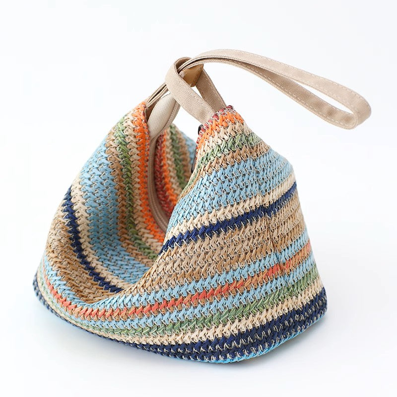 Handmade straw tote, clutch, and wristlet.