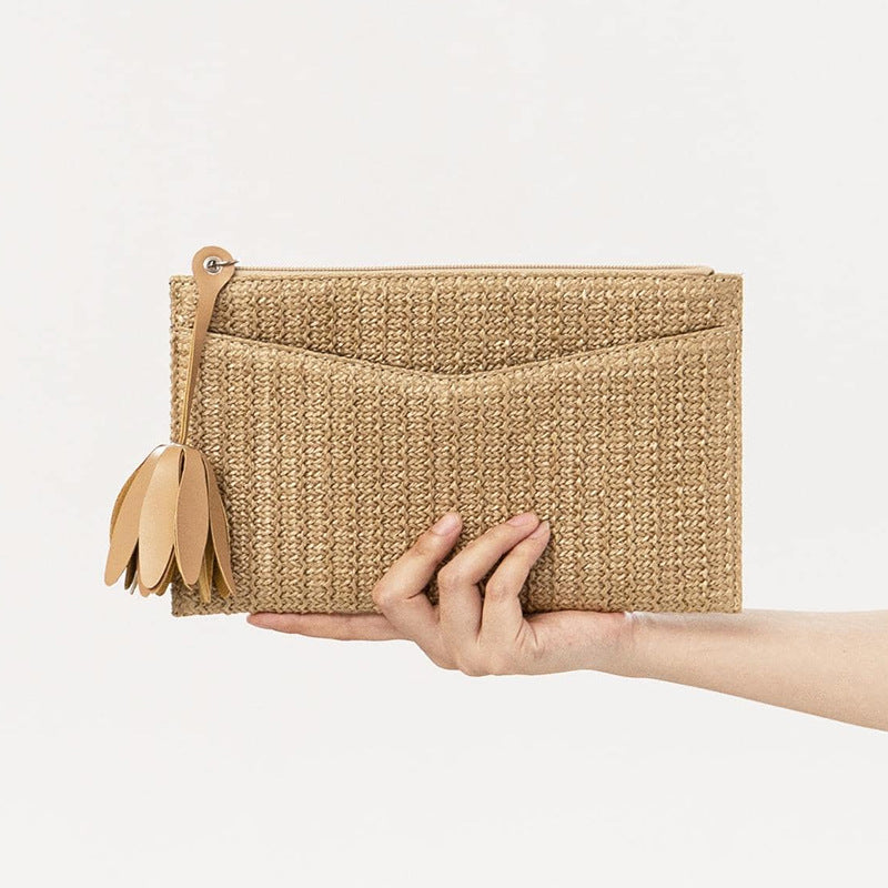 Holiday-inspired handmade straw clutch