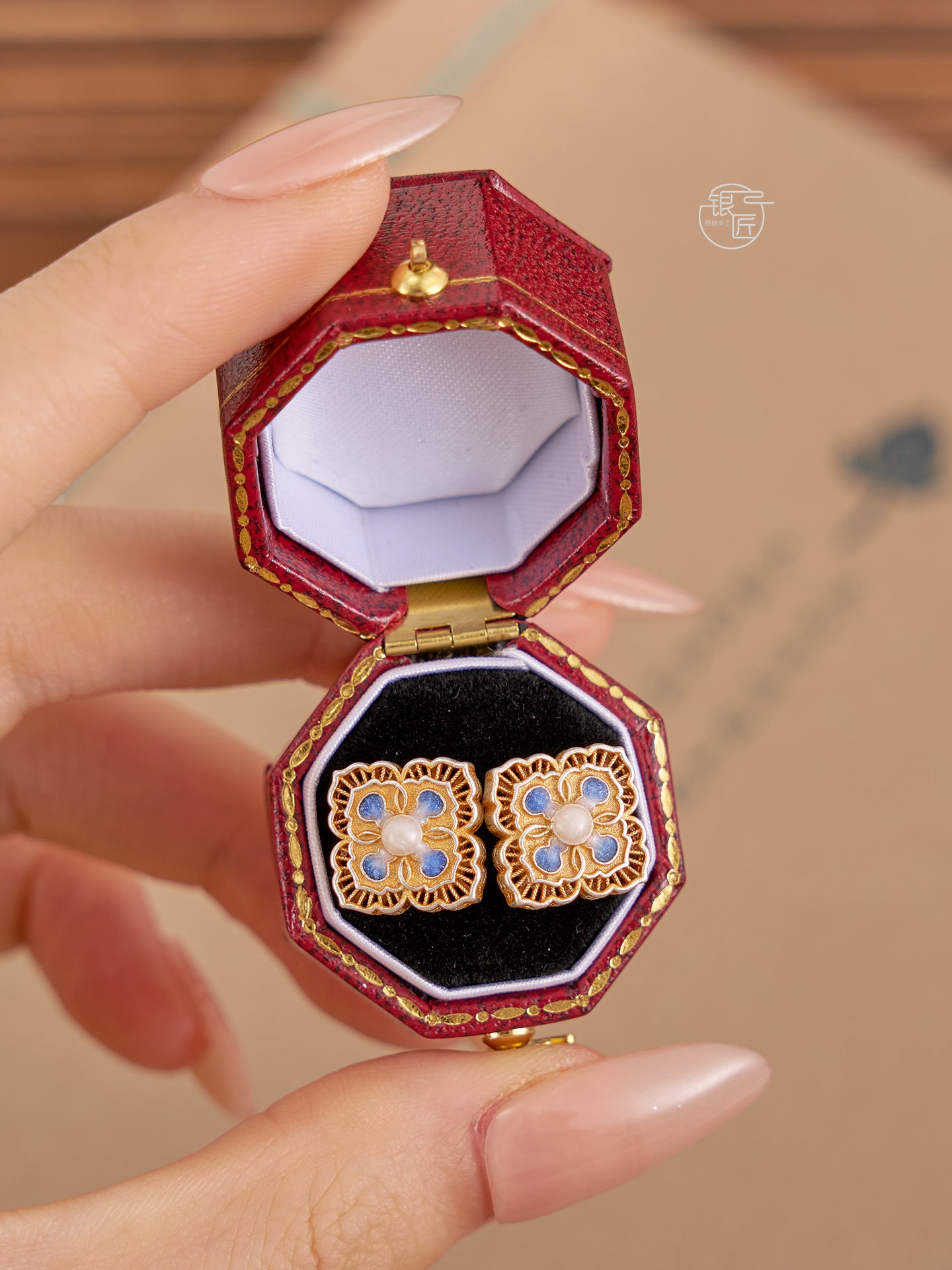 999.9 sterling silver earrings, gold-painted enamel earrings