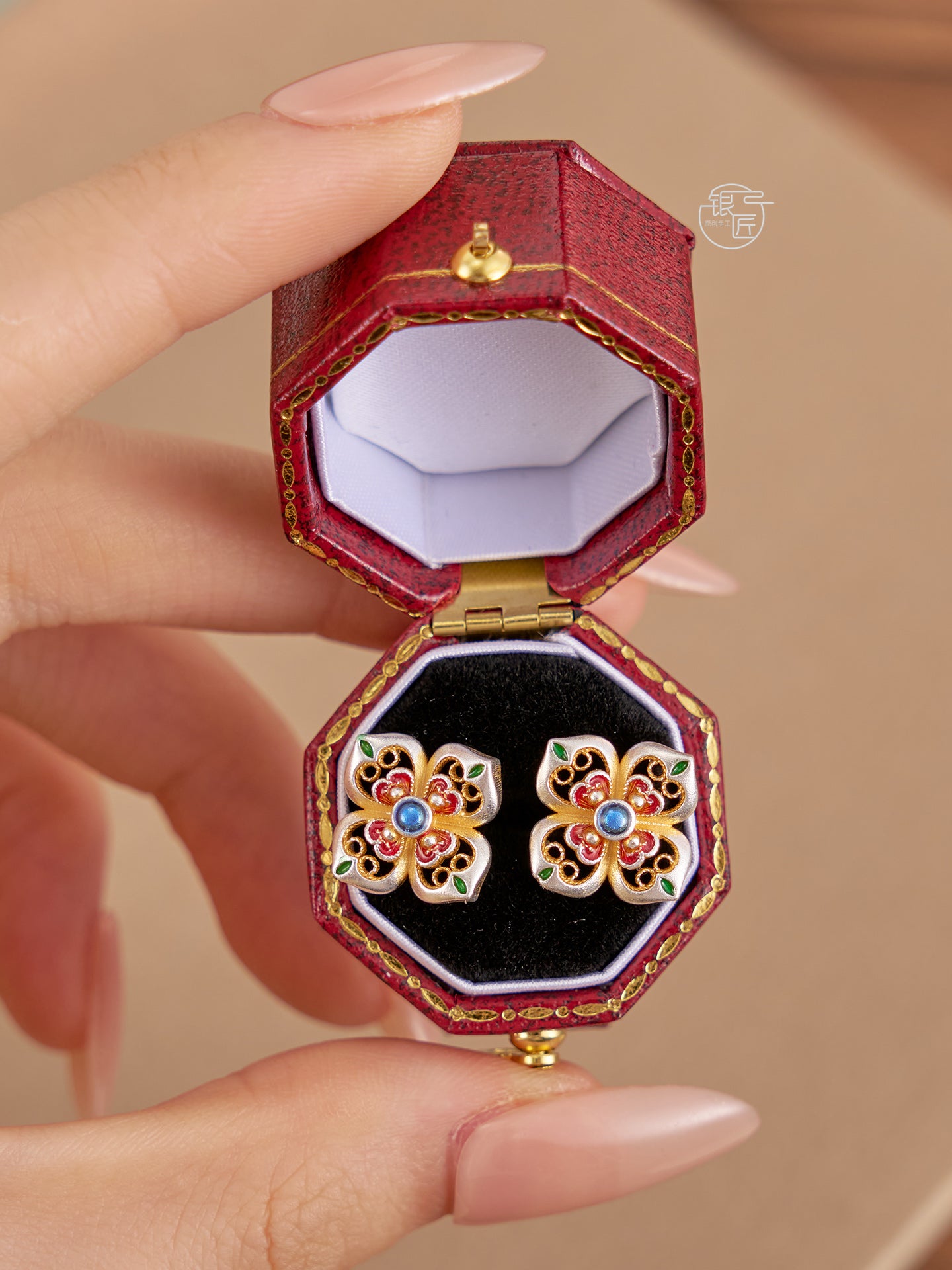 999.9 sterling silver earrings, gold-painted enamel earrings