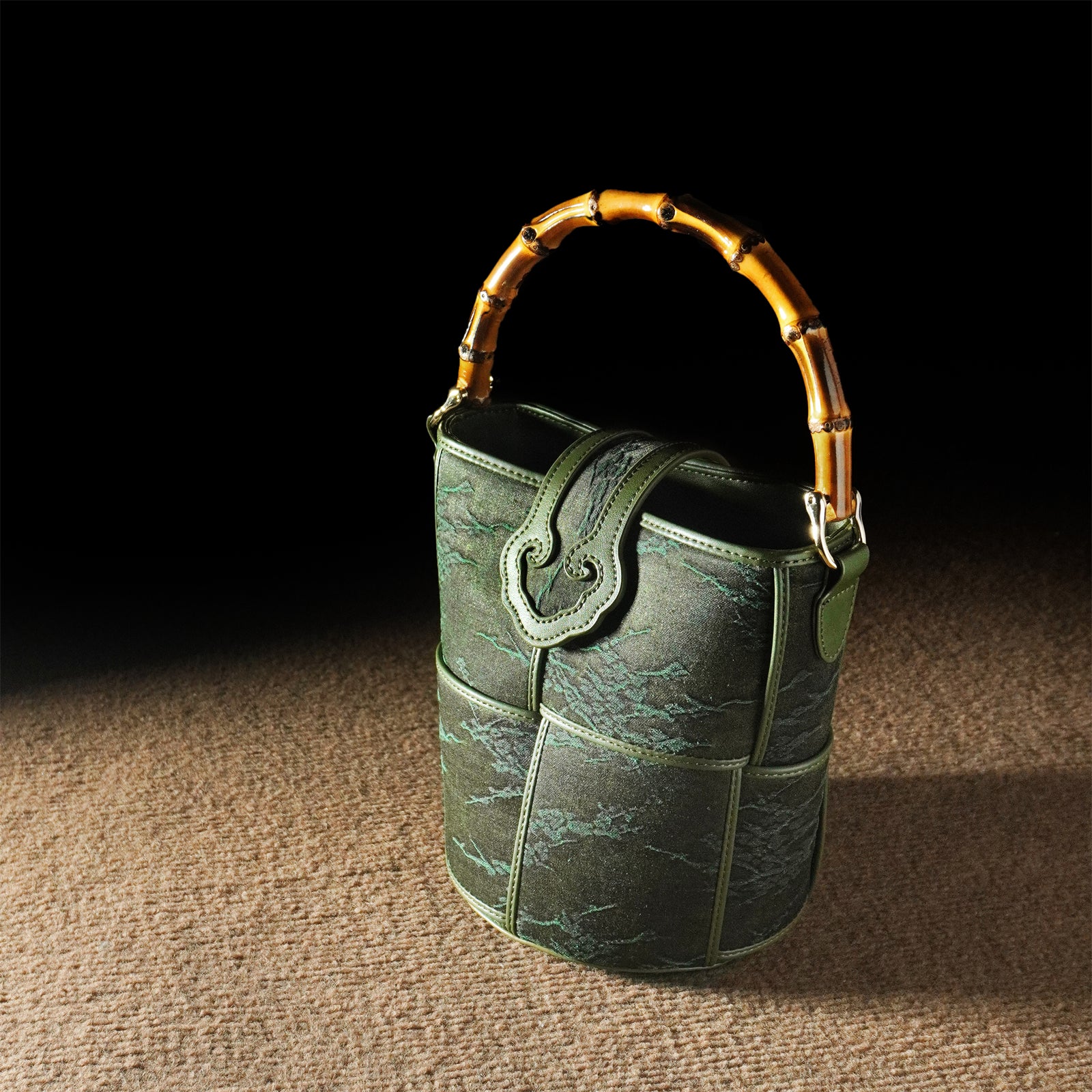 Xiangyunsha bucket bag, bamboo-knotted cowhide shoulder bag for women